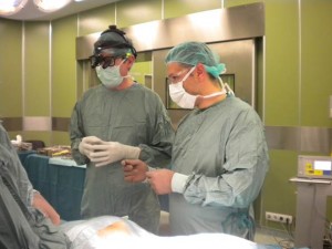 Dr David Clements, of the Scoliosis Research Society (left), scrubbing in with Dr Vasko Jablonski from Tokuda Hospital in Sofia Bulgaria, using Medtronic equipment donated through Orthopaedic Link for scoliosis surgeries.